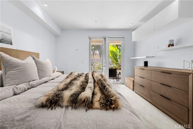 2233 Martin Unit 212, Irvine, CA 92612 - bedroom with light colored carpet and access to exterior