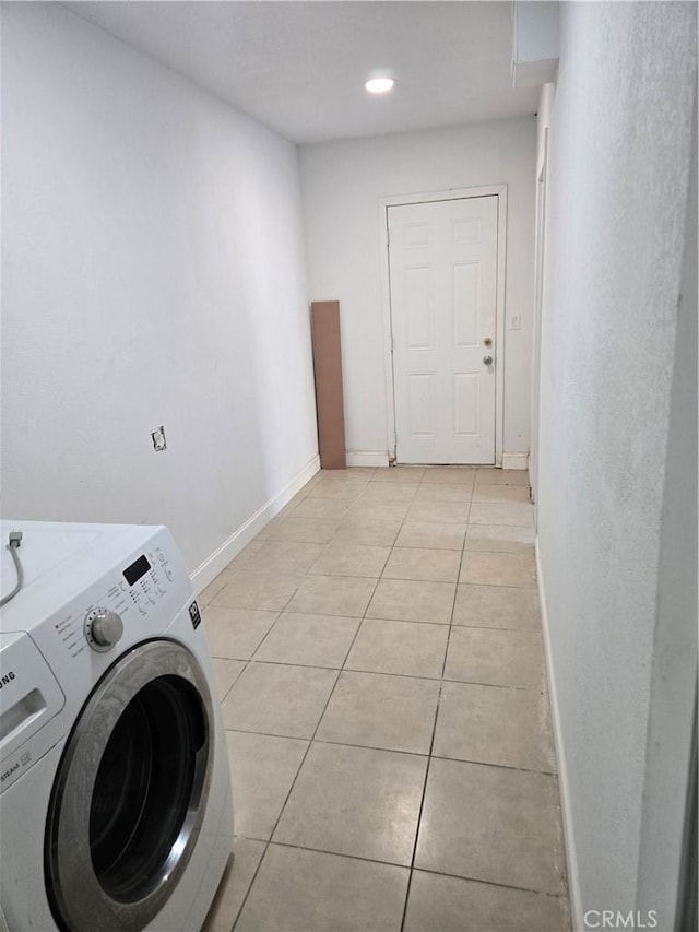 902 Boxwood Ln, Lemoore, CA 93245 - laundry room featuring washer / clothes dryer, light tile patterned floors, baseboards, and recessed lighting