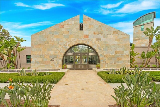 615 Rockefeller, Irvine, CA 92612 - doorway to property featuring stone siding