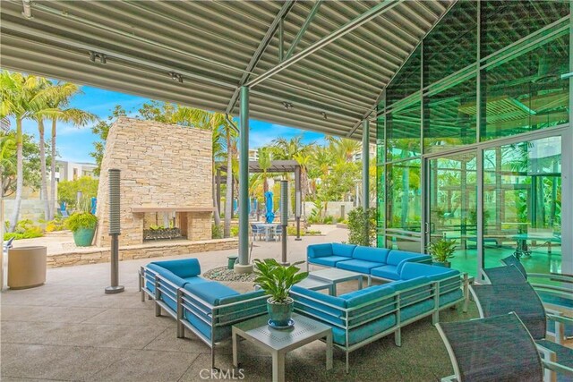 615 Rockefeller, Irvine, CA 92612 - view of patio / terrace with an outdoor living space with a fireplace