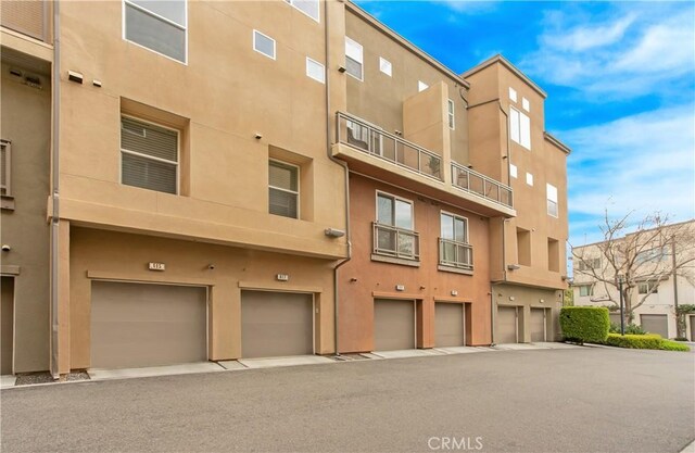615 Rockefeller, Irvine, CA 92612 - view of property with a garage