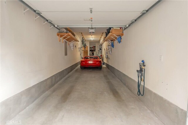 615 Rockefeller, Irvine, CA 92612 - garage featuring a garage door opener