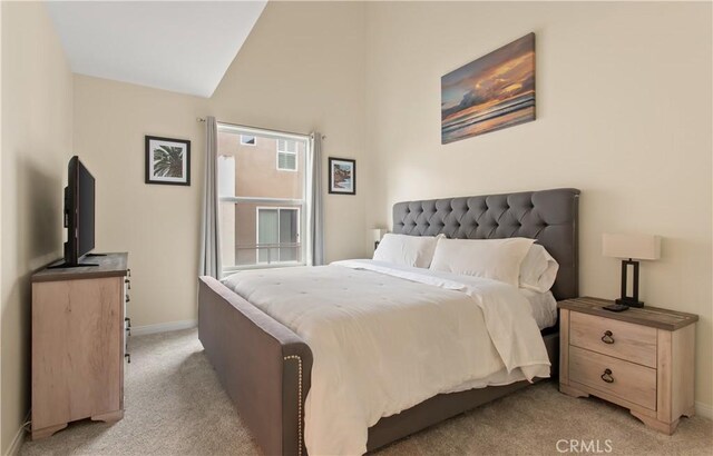 615 Rockefeller, Irvine, CA 92612 - bedroom featuring light colored carpet and vaulted ceiling