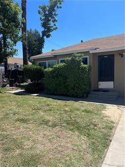 exterior space with a front yard and entry steps
