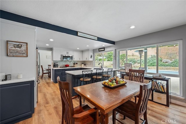 710 W Country Hills Dr W, La Habra, CA 90631 - dining space with light wood-style floors and recessed lighting