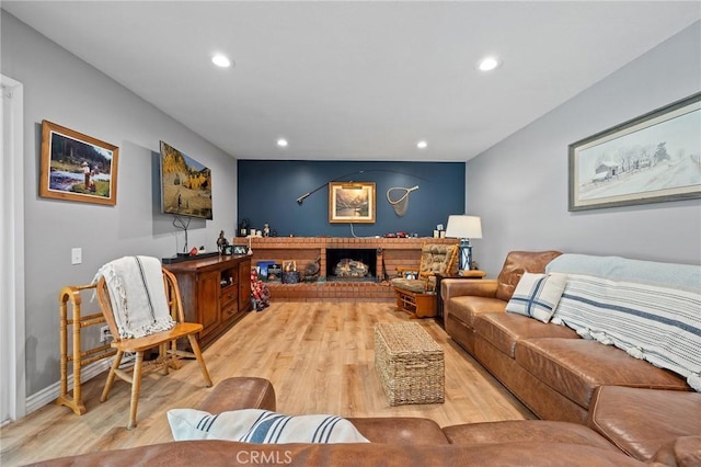 710 W Country Hills Dr W, La Habra, CA 90631 - living area featuring a brick fireplace, recessed lighting, and light wood-style floors