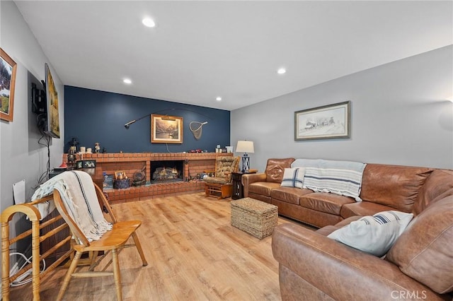 710 W Country Hills Dr W, La Habra, CA 90631 - living area featuring a brick fireplace, recessed lighting, and wood finished floors