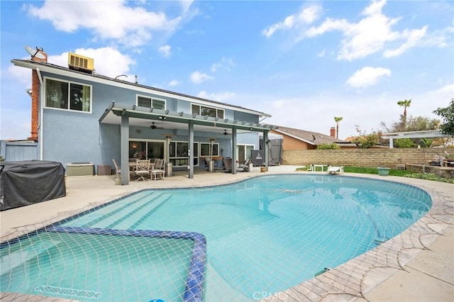 710 W Country Hills Dr W, La Habra, CA 90631 - exterior space with a patio, a fenced backyard, area for grilling, a ceiling fan, and a pool with connected hot tub