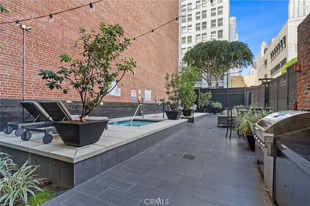 460 S Spring St Unit 302, Los Angeles, CA 90013 - view of patio / terrace with area for grilling and fence