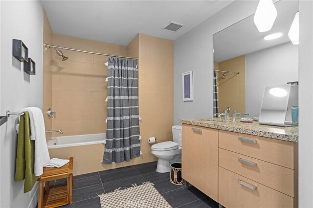 460 S Spring St Unit 302, Los Angeles, CA 90013 - full bath with tiled shower / bath, vanity, and tile patterned flooring