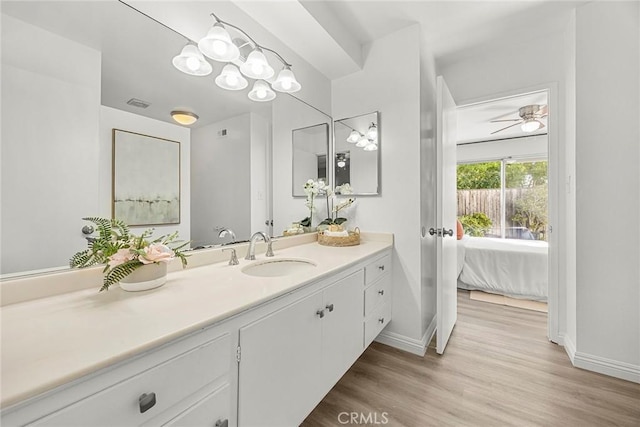 28 Brisbane Way, Irvine, CA 92612 - bathroom with vanity, wood finished floors, and ensuite bath