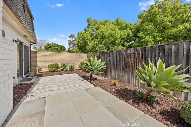 28 Brisbane Way, Irvine, CA 92612 - fenced backyard with a patio