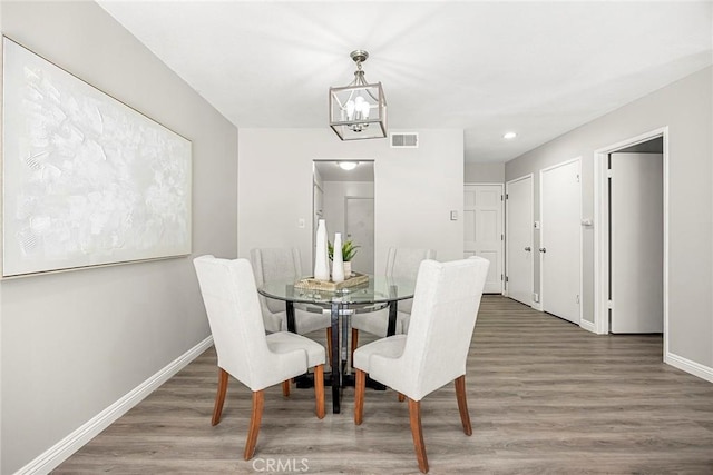 28 Brisbane Way, Irvine, CA 92612 - dining area featuring wood finished floors, a chandelier, and recessed lighting