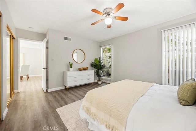28 Brisbane Way, Irvine, CA 92612 - bedroom with wood finished floors and ceiling fan