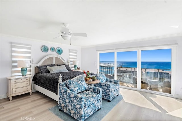 26056 Vista Dr E Unit 64, Dana Point, CA 92624 - bedroom featuring access to outside, light wood-style floors, and multiple windows