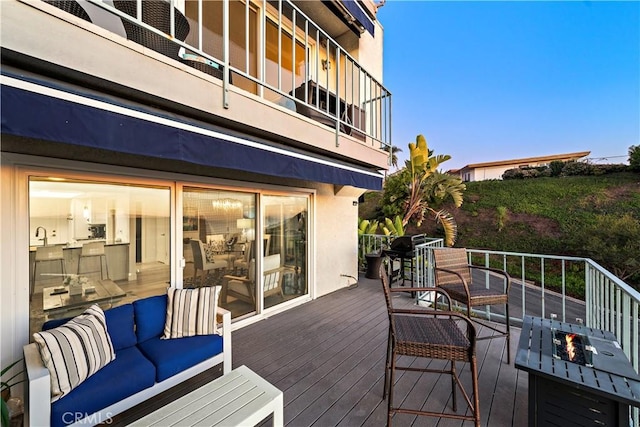 26056 Vista Dr E Unit 64, Dana Point, CA 92624 - wooden deck with an outdoor living space with a fire pit