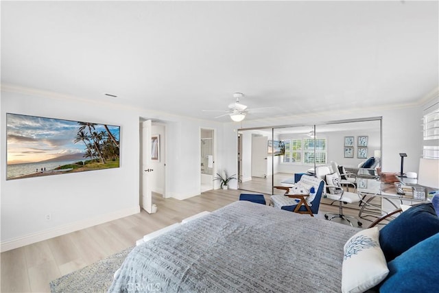 26056 Vista Dr E Unit 64, Dana Point, CA 92624 - bedroom with ceiling fan, baseboards, crown molding, and wood finished floors