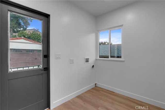 3649 Mount Vernon Dr, View Park, CA 90008 - interior space with light wood finished floors, electric dryer hookup, laundry area, baseboards, and hookup for a washing machine