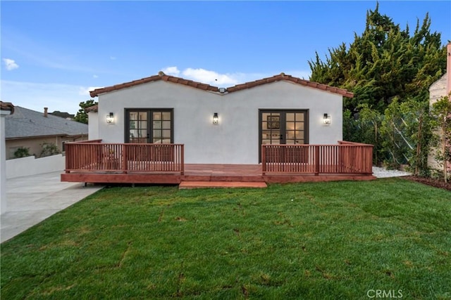 3649 Mount Vernon Dr, View Park, CA 90008 - rear view of property featuring stucco siding, a wooden deck, french doors, and a yard