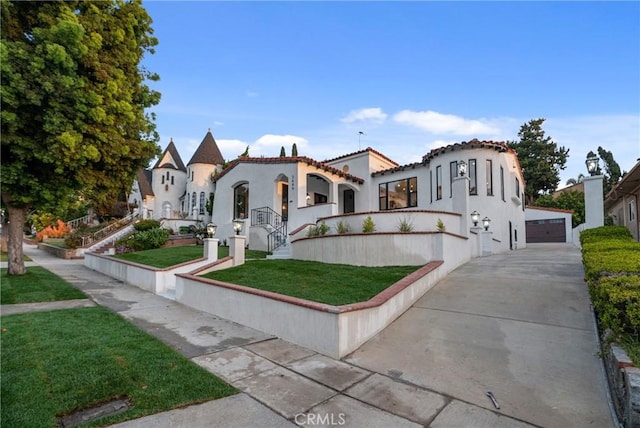 3649 Mount Vernon Dr, View Park, CA 90008 - mediterranean / spanish-style house with a front yard, stucco siding, an outbuilding, a residential view, and a tiled roof