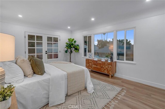 3649 Mount Vernon Dr, View Park, CA 90008 - bedroom featuring baseboards, wood finished floors, french doors, and recessed lighting