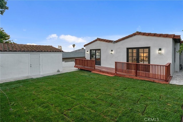 3649 Mount Vernon Dr, View Park, CA 90008 - rear view of house with a tiled roof, a deck, stucco siding, french doors, and a yard