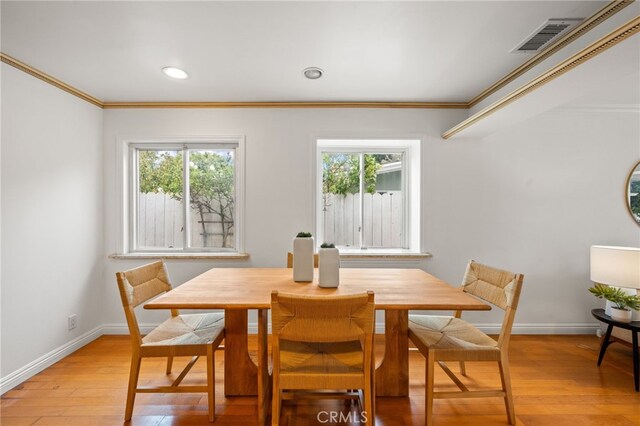 3569 Kelton Ave, Los Angeles, CA 90034 - dining room with ornamental molding, plenty of natural light, baseboards, light wood finished floors, and recessed lighting
