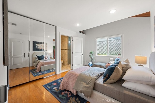 3569 Kelton Ave, Los Angeles, CA 90034 - bedroom with light wood-style floors, recessed lighting, and ensuite bath