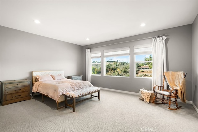 bedroom with carpet floors, baseboards, and recessed lighting