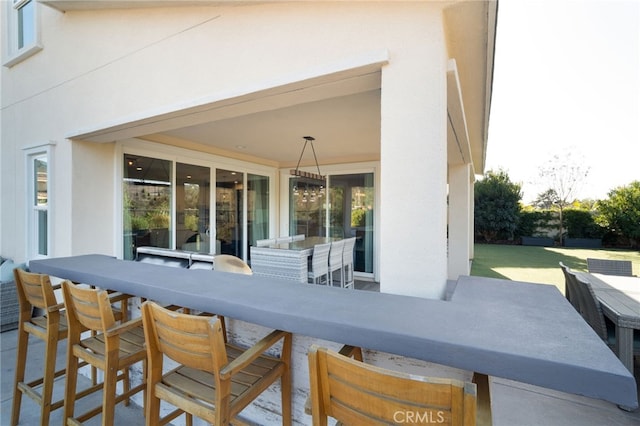 view of patio with outdoor dining area
