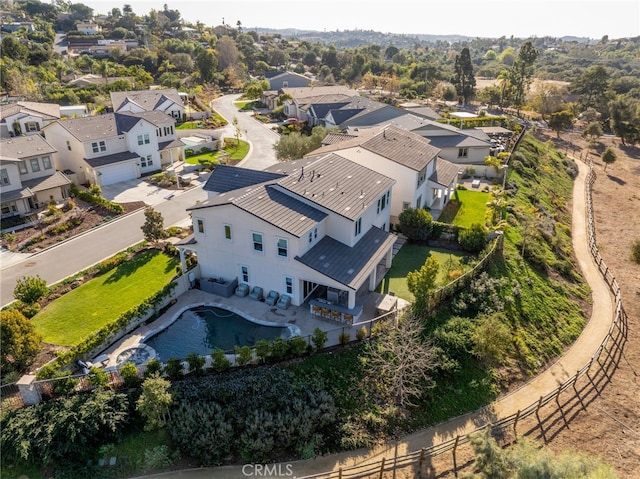 birds eye view of property with a residential view
