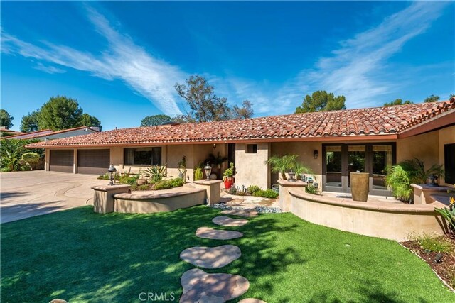 23815 Park Belmonte, Calabasas, CA 91302 - back of house with a garage, driveway, stucco siding, and a tiled roof