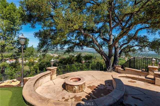 23815 Park Belmonte, Calabasas, CA 91302 - view of patio / terrace featuring a fire pit