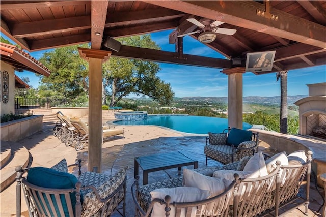 23815 Park Belmonte, Calabasas, CA 91302 - view of patio / terrace featuring a gazebo, ceiling fan, a pool with connected hot tub, and an outdoor hangout area