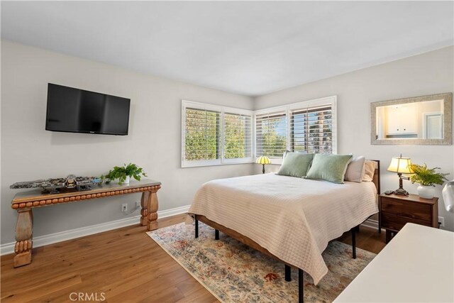 23815 Park Belmonte, Calabasas, CA 91302 - bedroom with wood finished floors and baseboards