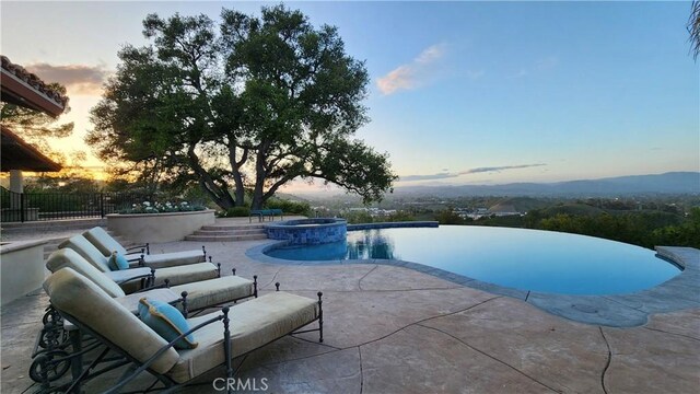 23815 Park Belmonte, Calabasas, CA 91302 - view of swimming pool with a patio and a pool with connected hot tub