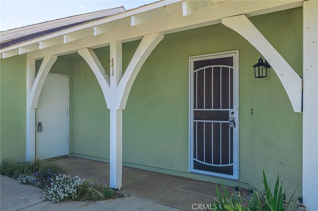 43421 45th St W, Lancaster, CA 93536 - doorway to property featuring stucco siding