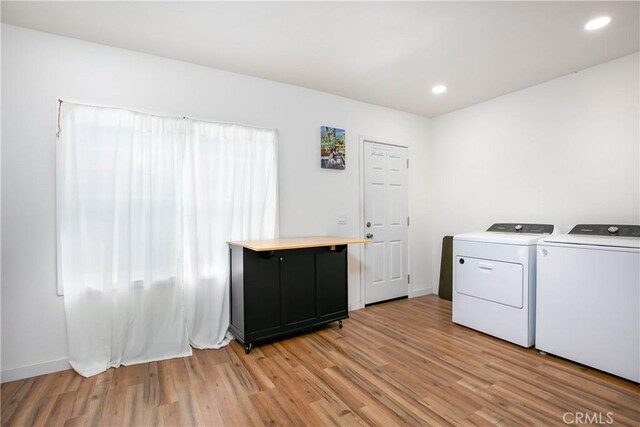 523 Lincoln Ave, Pasadena, CA 91103 - laundry area featuring a wealth of natural light, light wood finished floors, separate washer and dryer, laundry area, and recessed lighting