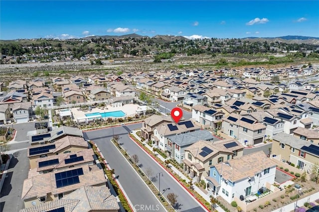 drone / aerial view with a residential view and a mountain view