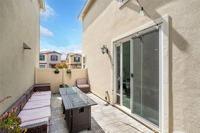 view of patio featuring fence