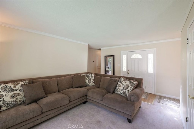 living room featuring baseboards, crown molding, and light carpet