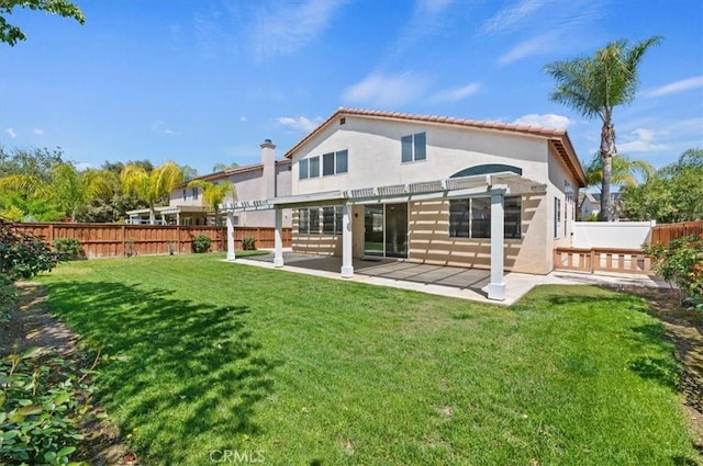 23403 Mountain Song, Murrieta, CA 92562 - back of property featuring a pergola, a patio area, a fenced backyard, and a lawn
