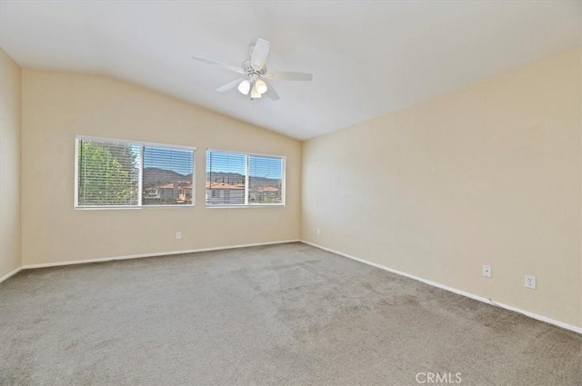 23403 Mountain Song, Murrieta, CA 92562 - unfurnished room featuring baseboards, carpet flooring, ceiling fan, and vaulted ceiling