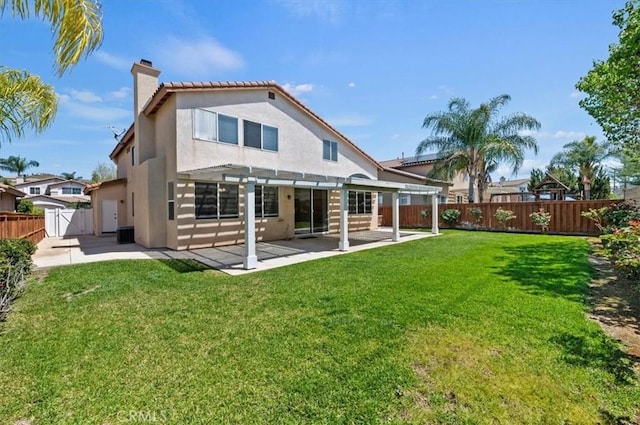 23403 Mountain Song, Murrieta, CA 92562 - back of house featuring a patio area, a fenced backyard, stucco siding, and a chimney