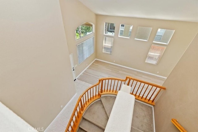 23403 Mountain Song, Murrieta, CA 92562 - stairs with baseboards and wood finished floors