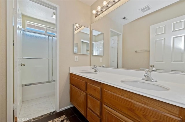 23403 Mountain Song, Murrieta, CA 92562 - bathroom with double vanity, visible vents, and a sink