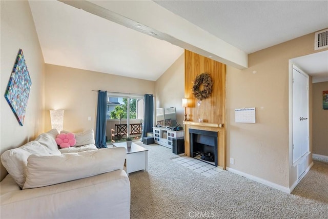 carpeted living area featuring lofted ceiling with beams, a fireplace, and baseboards