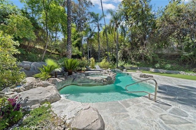 pool featuring a patio area