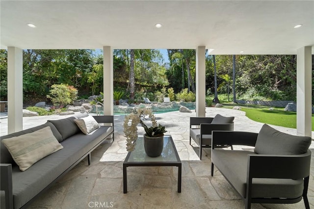 view of patio / terrace featuring an outdoor pool and an outdoor hangout area