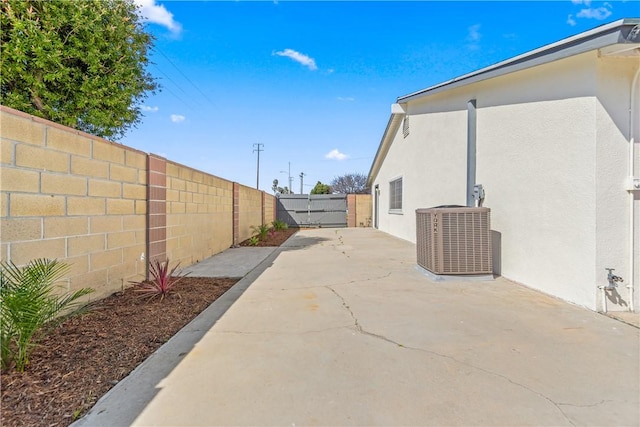 10022 Bismark Dr, Huntington Beach, CA 92646 - view of patio / terrace with a fenced backyard and central AC unit